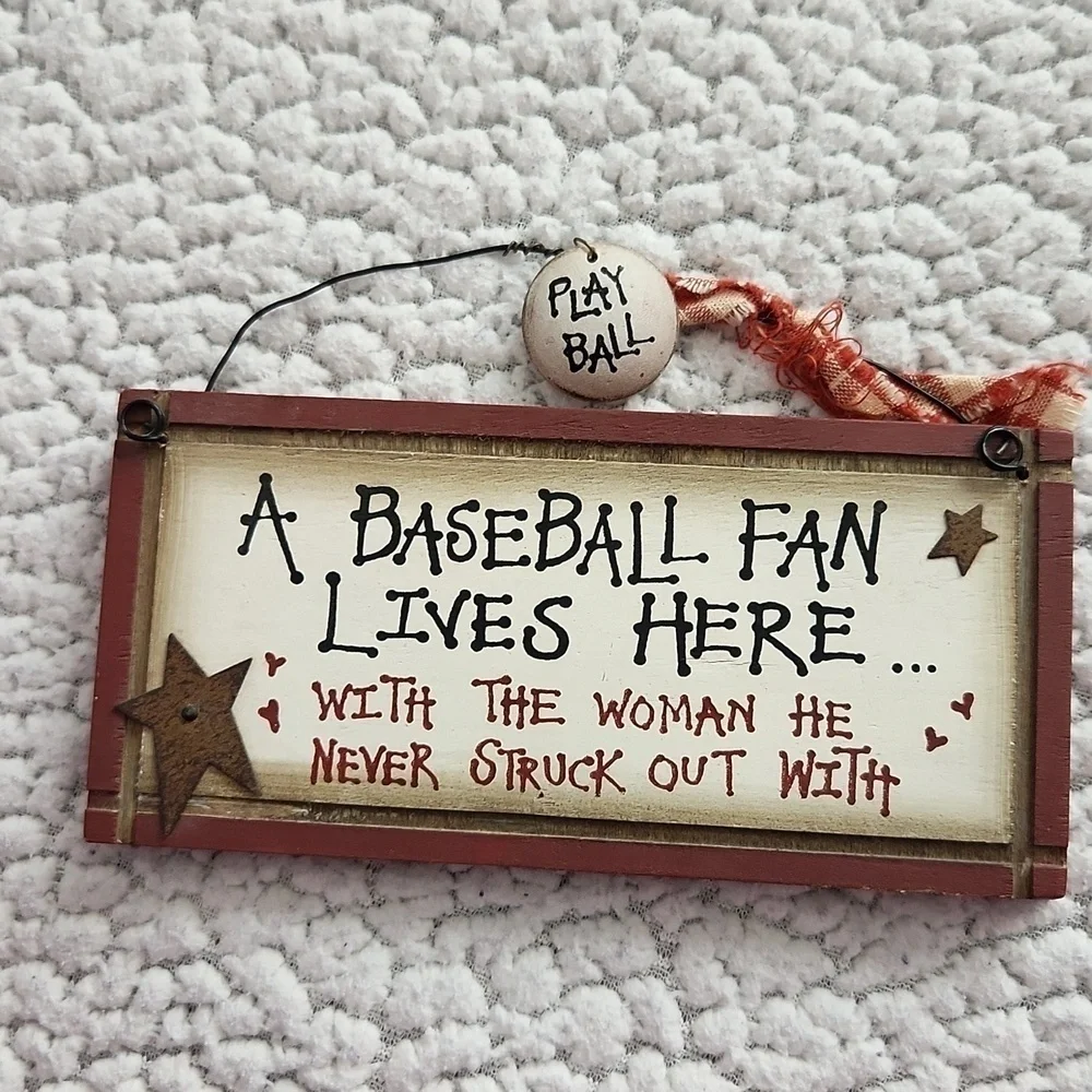 MLB A Baseball fan lives here with a woman. He never struck out with. De…
